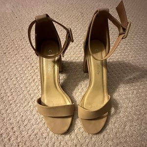 Women’s classified tan ankle strap block heels. Only worn once. Size 6.